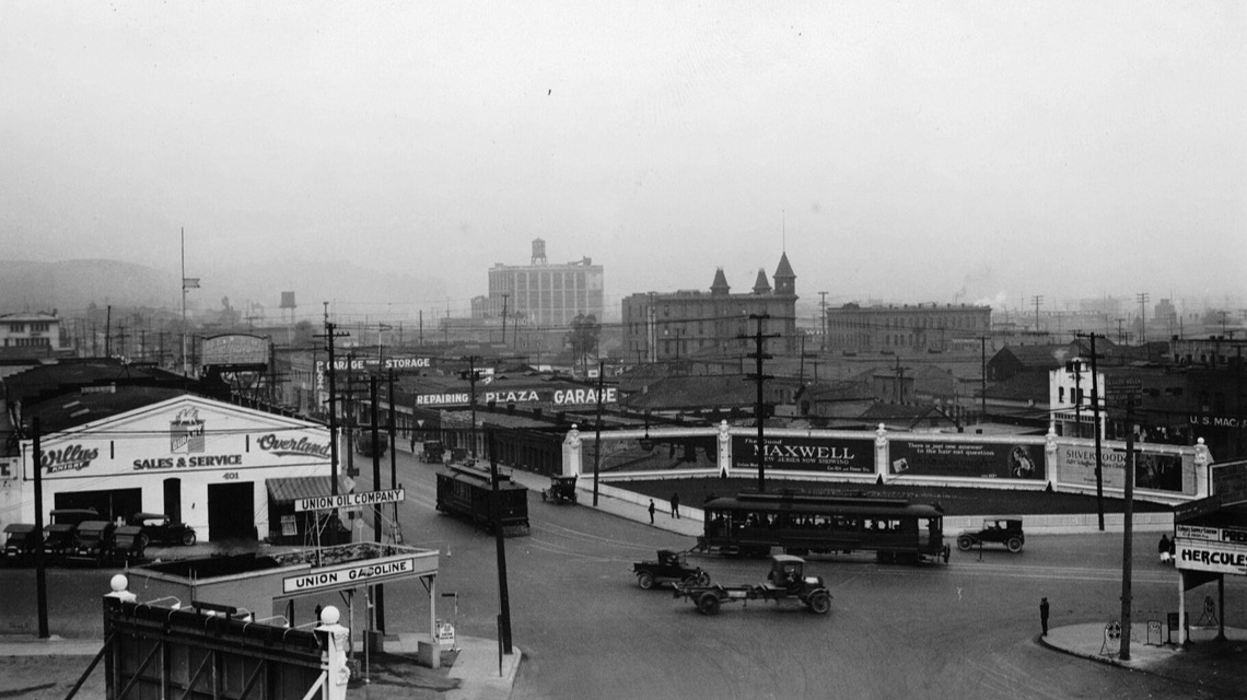 A busy Los Angeles intersection in 1922, with streetcars, early automobiles and a Union Gasoline station